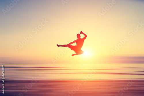 abstract flying kick photo