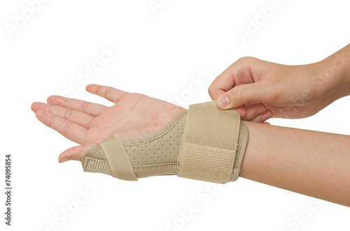 Sport injury, wrist with brace support release pain