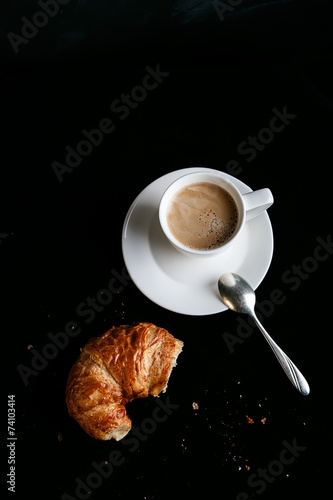Coffee and croissant top view