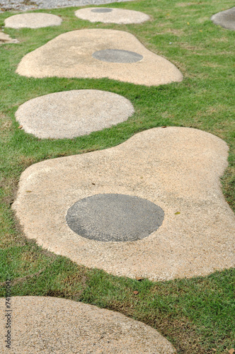 Beautiful stones shape on green yard