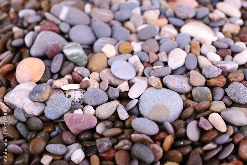 Naklejka premium Sea stones as background