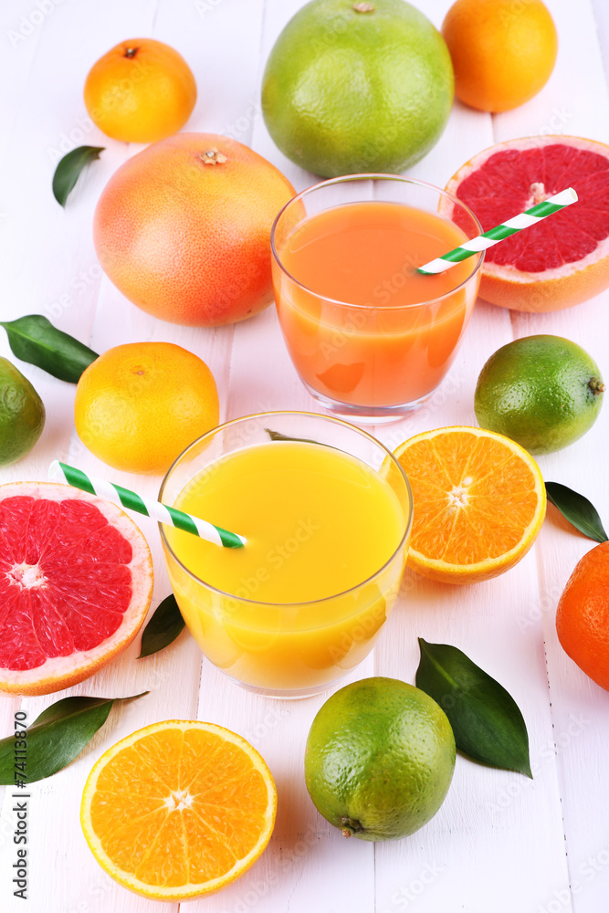 Juices and many citrus close-up Juices and many citrus close-up
