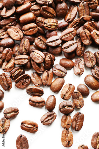 Coffee beans on white table  close-up