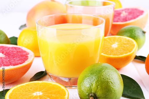 Juices and many citrus close-up