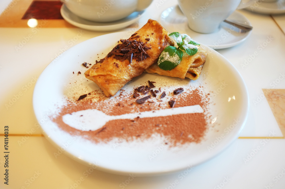 Tasty pancakes on plate in cafe Tasty pancakes on plate in cafe