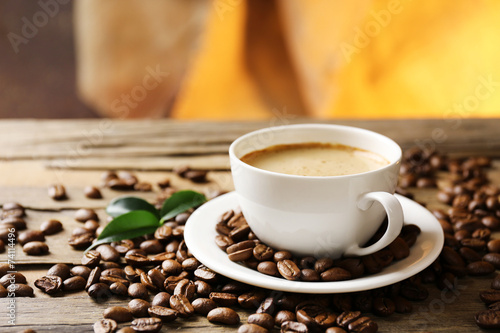 Cup of coffee on wooden table