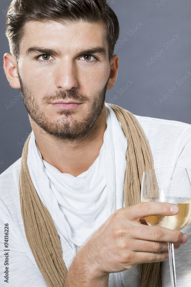 Sexy handsome man drinking white wine Sexy handsome man drinking white wine