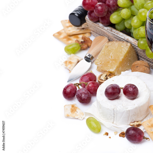 cheeses, red and green grapes, crackers, isolated