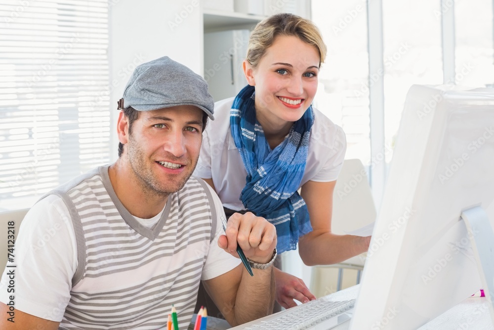 Obraz premium Editorial team working together smiling at camera