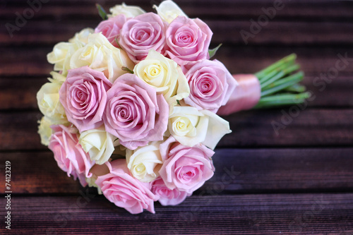 Wedding bouquet of fresh bridal flowers on dark © Patrycja