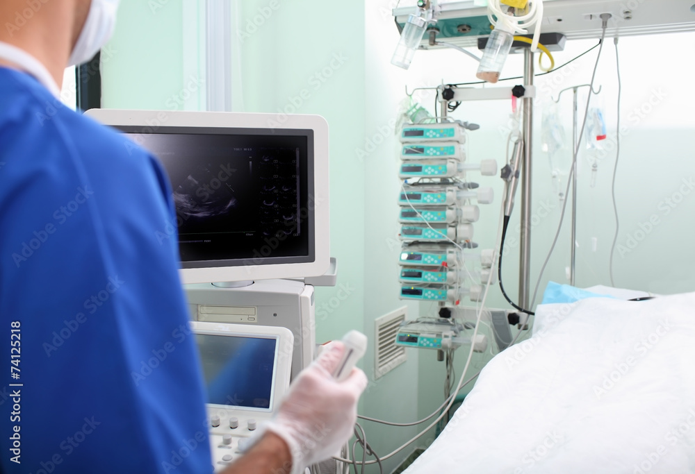 Ultrasound examination of the patient in the ward. Ultrasound examination of the patient in the ward.