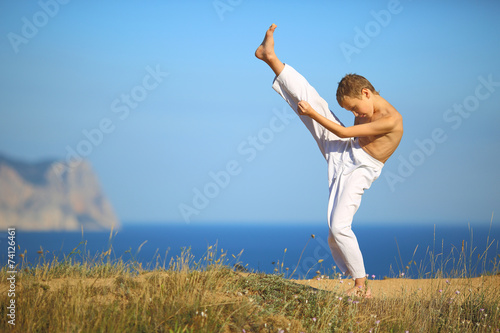 boy karate on the coast © komi$ar