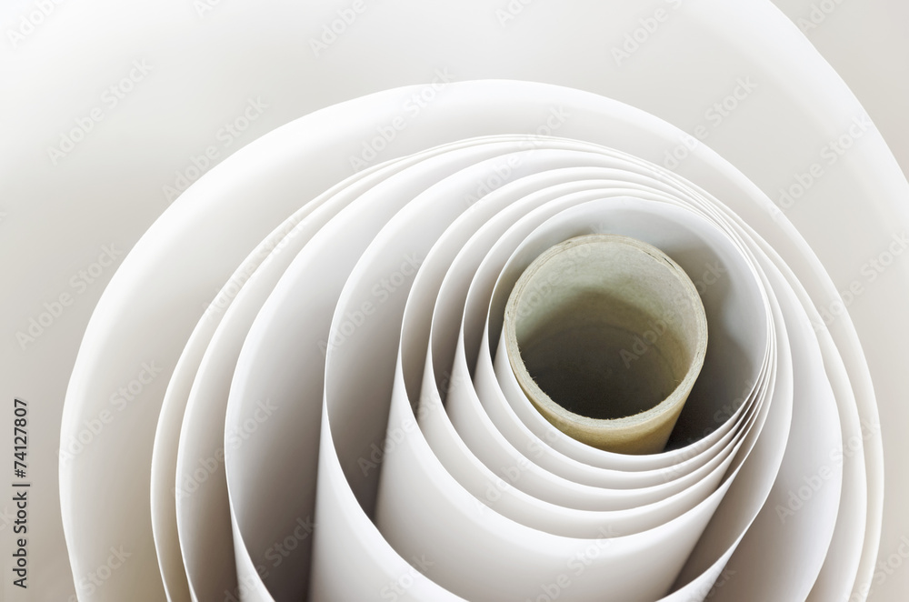 Fototapeta premium Topshot macro Paper roll spiral in a printshop