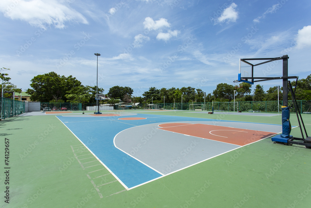 Fototapeta premium Outdoor basketball court in Thailand on a sunny day