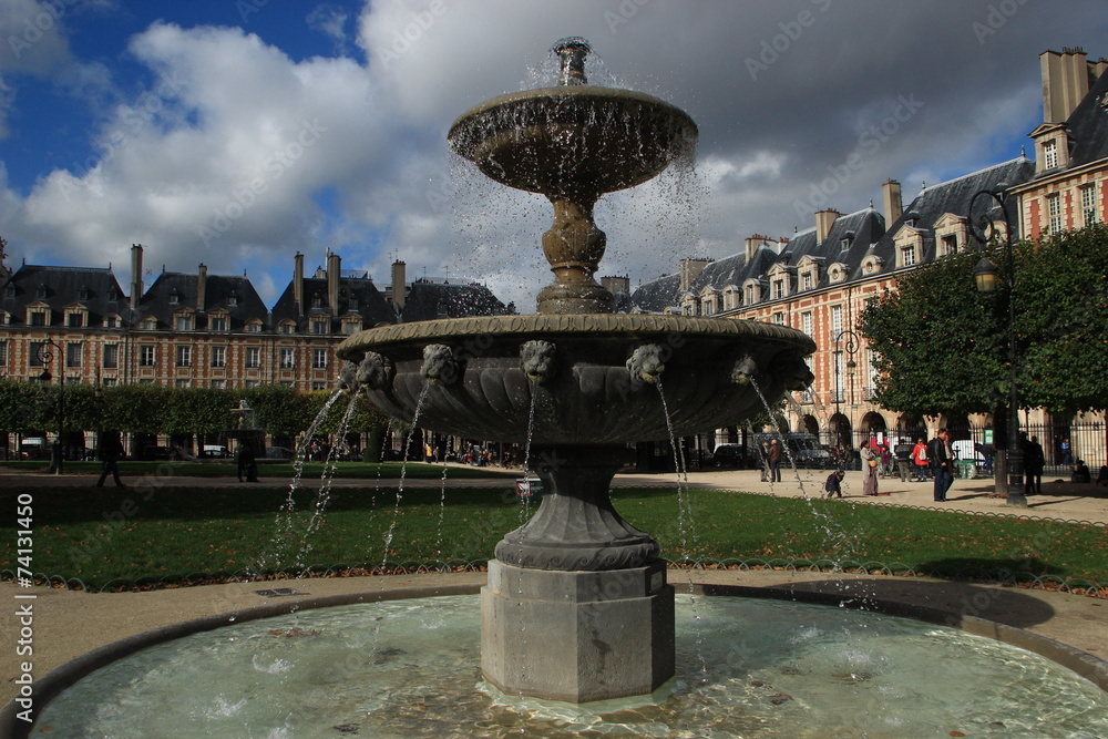 Fountain in Place des Vosges Paris (landscape setting)