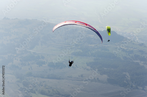 Paragliding above the mountain range