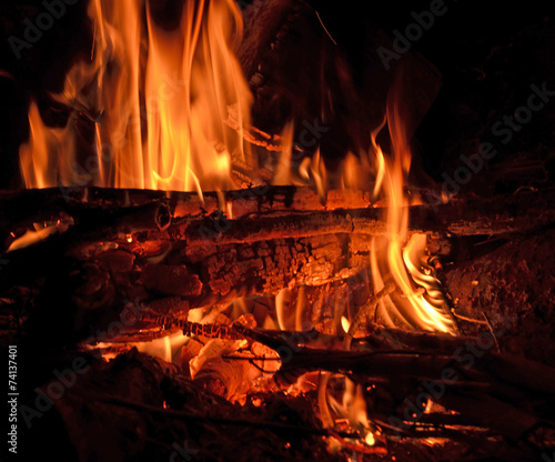 fire flames in fireplace - black background xmas