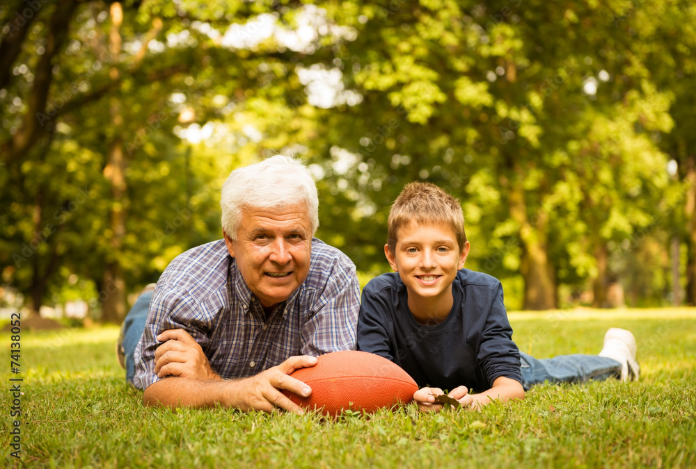 Grandfather and grandson in the park Grandfather and grandson in the park
