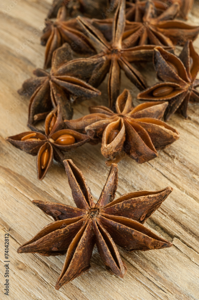 Star anise on wooden background Star anise on wooden background