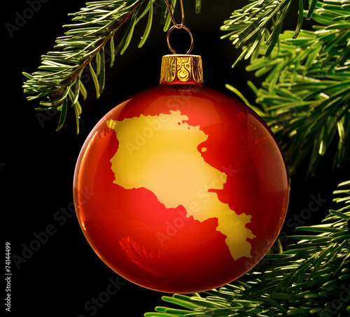 Red bauble with the golden shape of Armenia