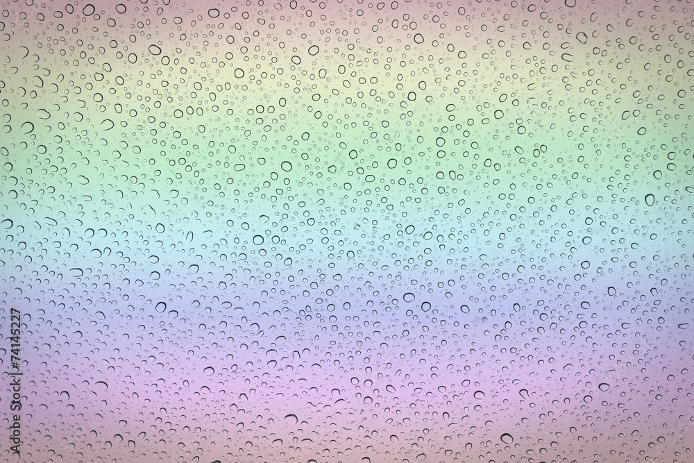 colorful water drops on a window colorful water drops on a window