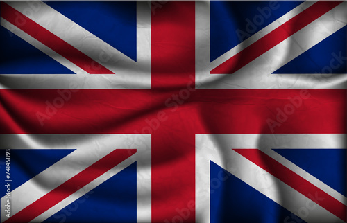 crumpled flag of United Kingdom on a light background