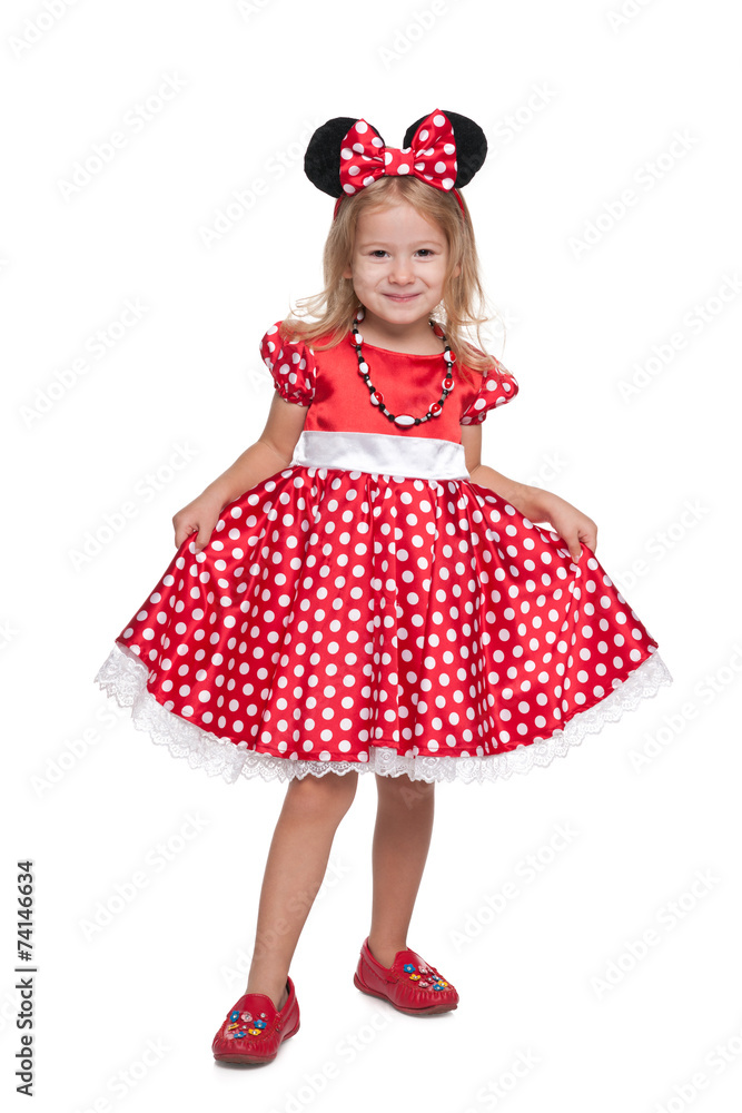 Little girl stands against the white Little girl stands against the white
