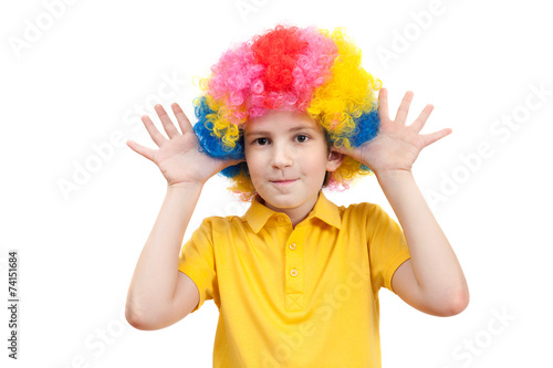 the boy in the carnival clown wig