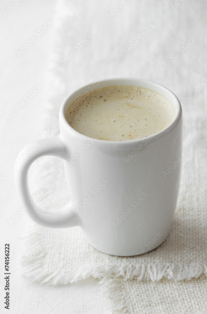 Cappuccino in a white mug Cappuccino in a white mug