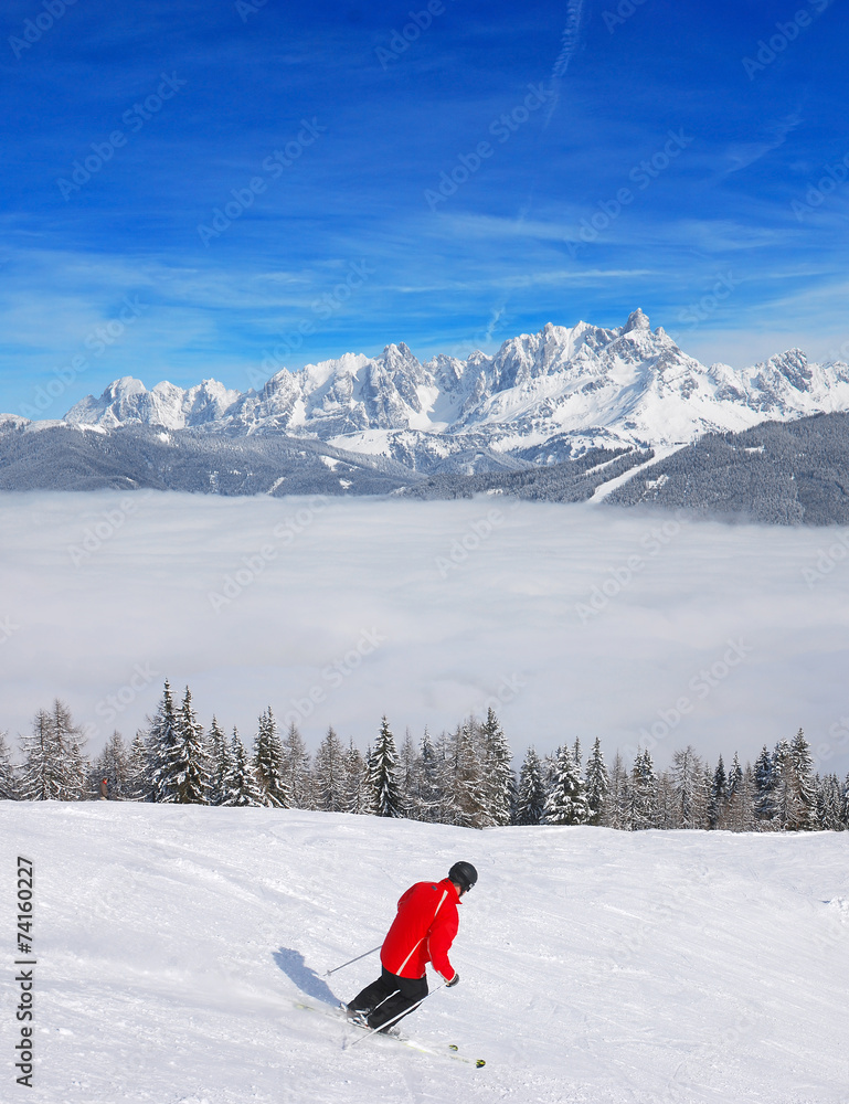 Skier above the clouds