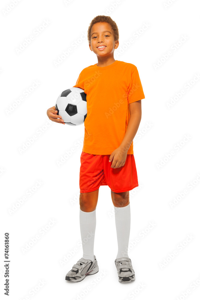 Little African boy holding soccer ball isolated Little African boy holding soccer ball isolated