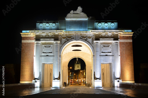 Illuminated menin gate in belgian city ypres/ieper. photo