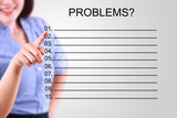 business woman pointing problem list