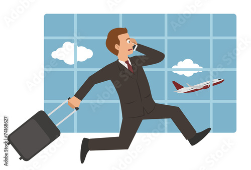 businessman with suitcase running to catch plane