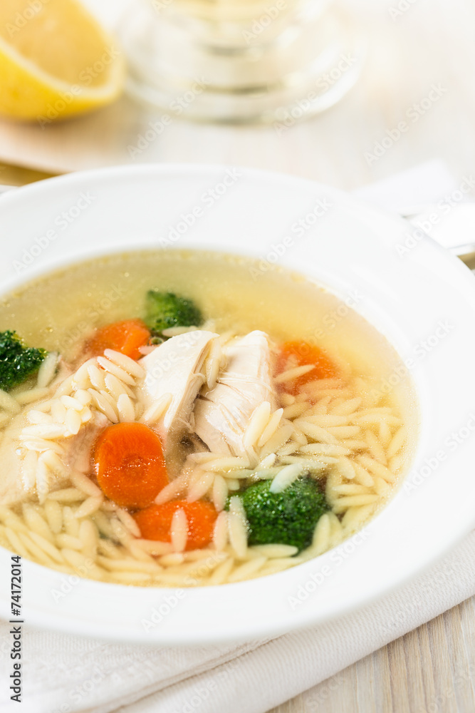 Chicken soup with vegetables and orzo