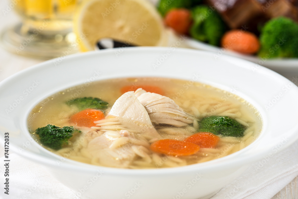 Chicken soup with vegetables and orzo