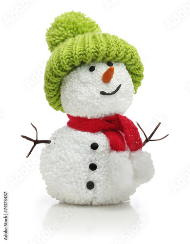 Snowman in green hat and red scarf