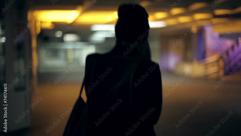 Girl teenager goes at night in the underpass Girl teenager goes at night in the underpass