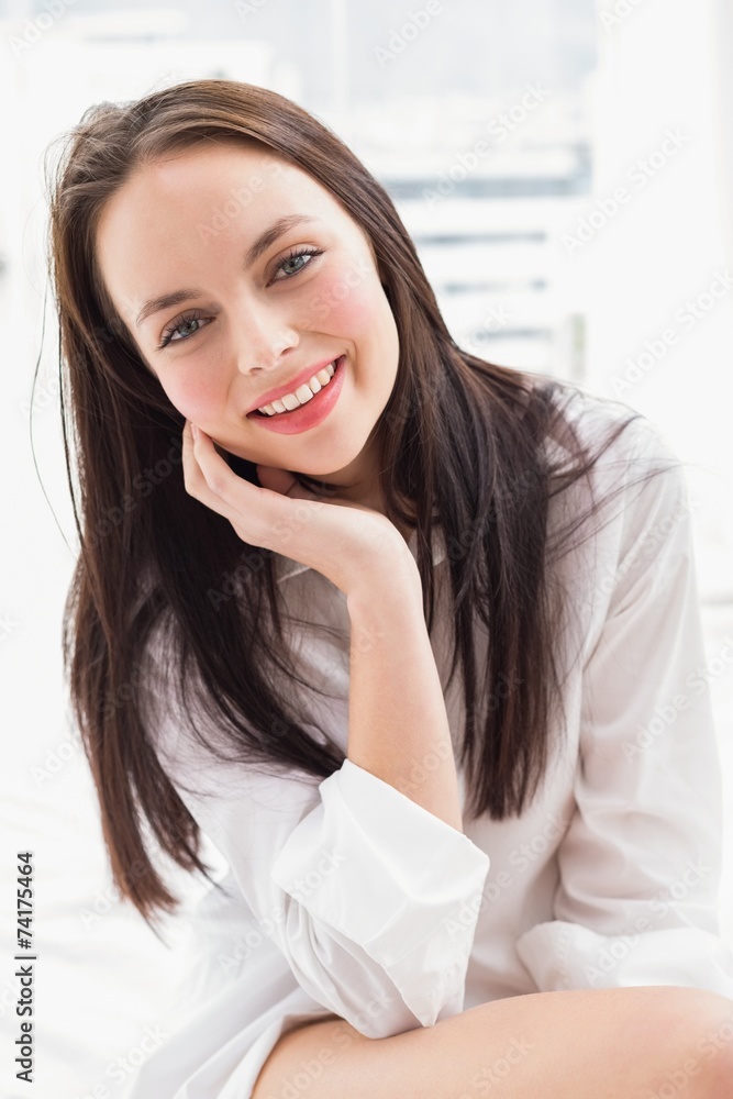 Pretty brunette smiling at camera Pretty brunette smiling at camera