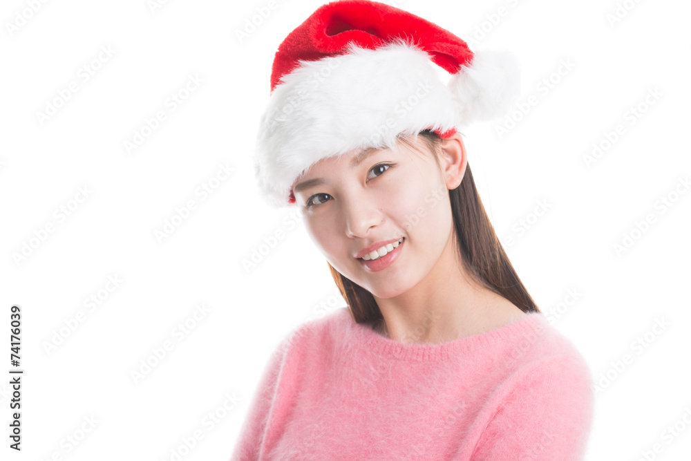 Young asian woman with Christmas hat isolated on white. Young asian woman with Christmas hat isolated on white.