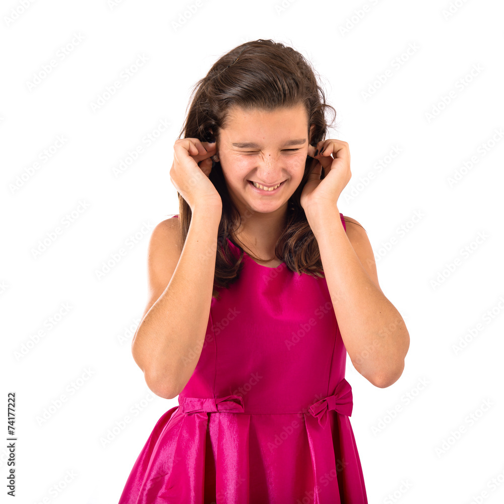 Girl covering her ears over white background Girl covering her ears over white background