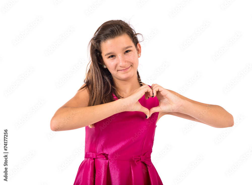 Girl making a heart with her hands over white background Girl making a heart with her hands over white background
