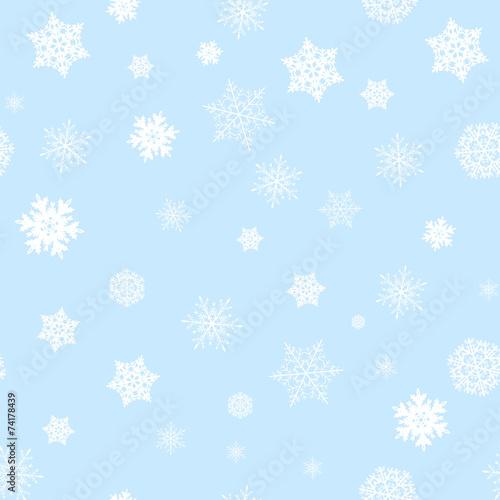 Snowflake on blue background seamless pattern