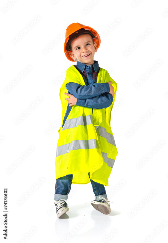 child dressed as a workman with his arms crossed child dressed as a workman with his arms crossed