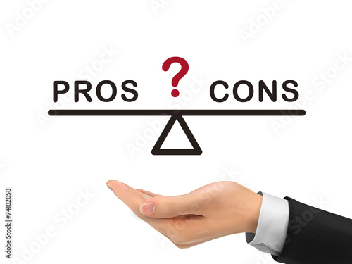 balance between pros and cons holding by realistic hand