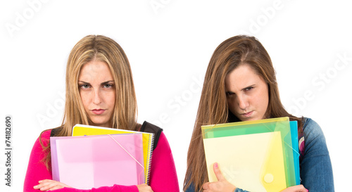 Angry students over isolated white background