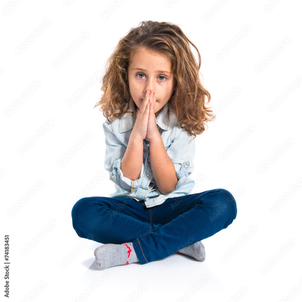 Blonde little girl pleading over white background Blonde little girl pleading over white background