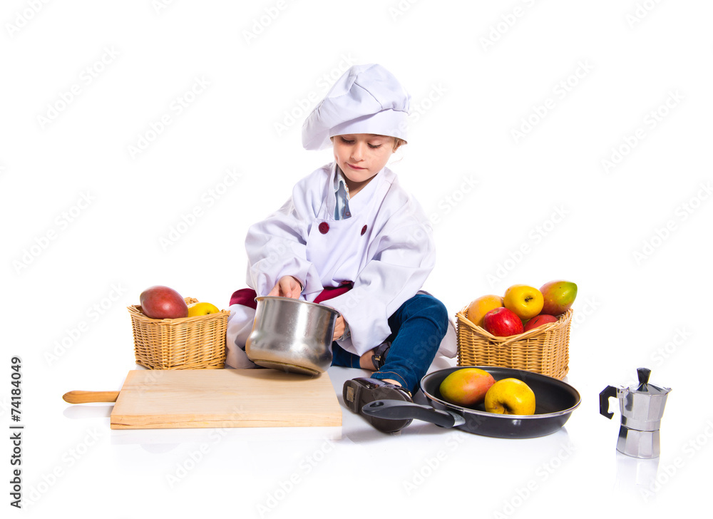 Blonde little girl dressed like chef Blonde little girl dressed like chef