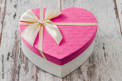 Heart Shaped Gift Box on white wooden table
