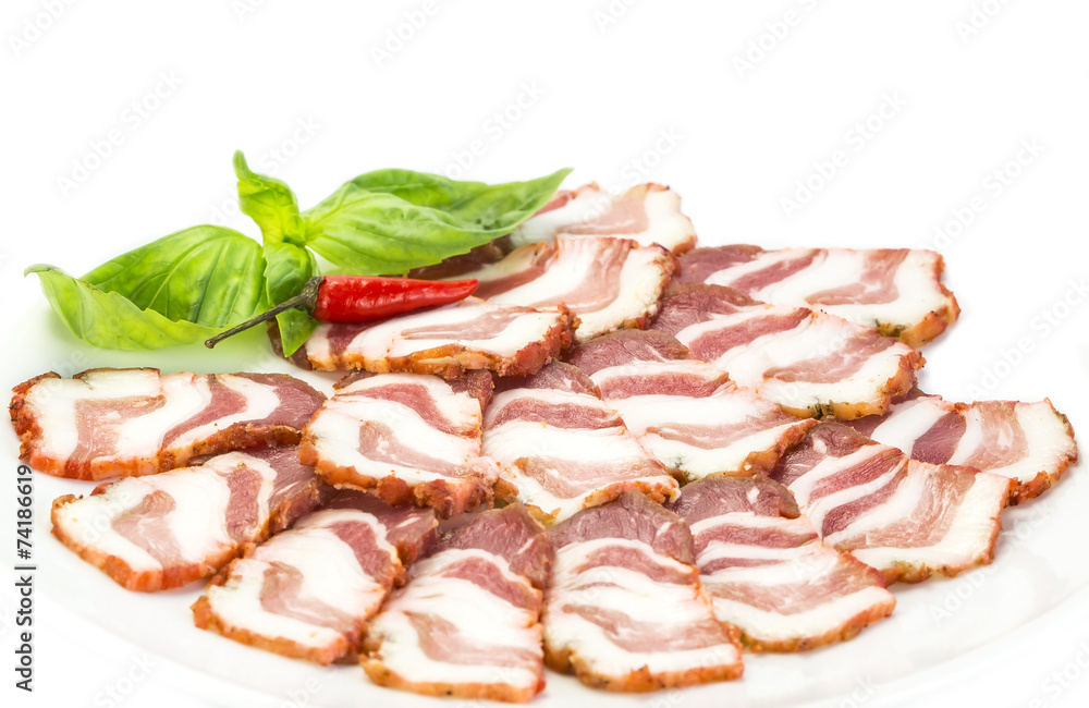 bacon, onion and pepper on a plate in a restaurant bacon, onion and pepper on a plate in a restaurant